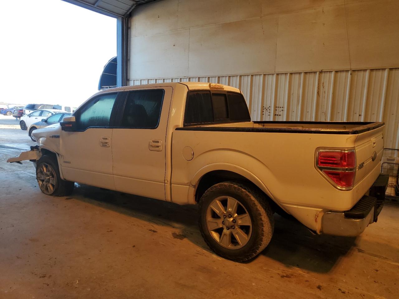 2011 Ford F-150 VIN 1FTFW1CTXBKD81237 Copart auction photo, front end / rear end damage thumbnail 2