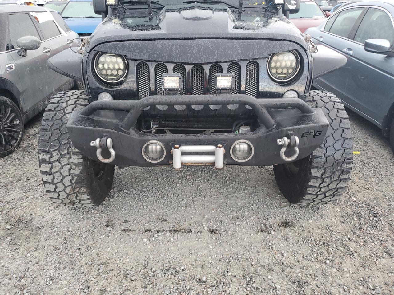 2014 Jeep Wrangler VIN 1C4BJWDGXEL231896 Copart auction photo, water/flood damage thumbnail 11