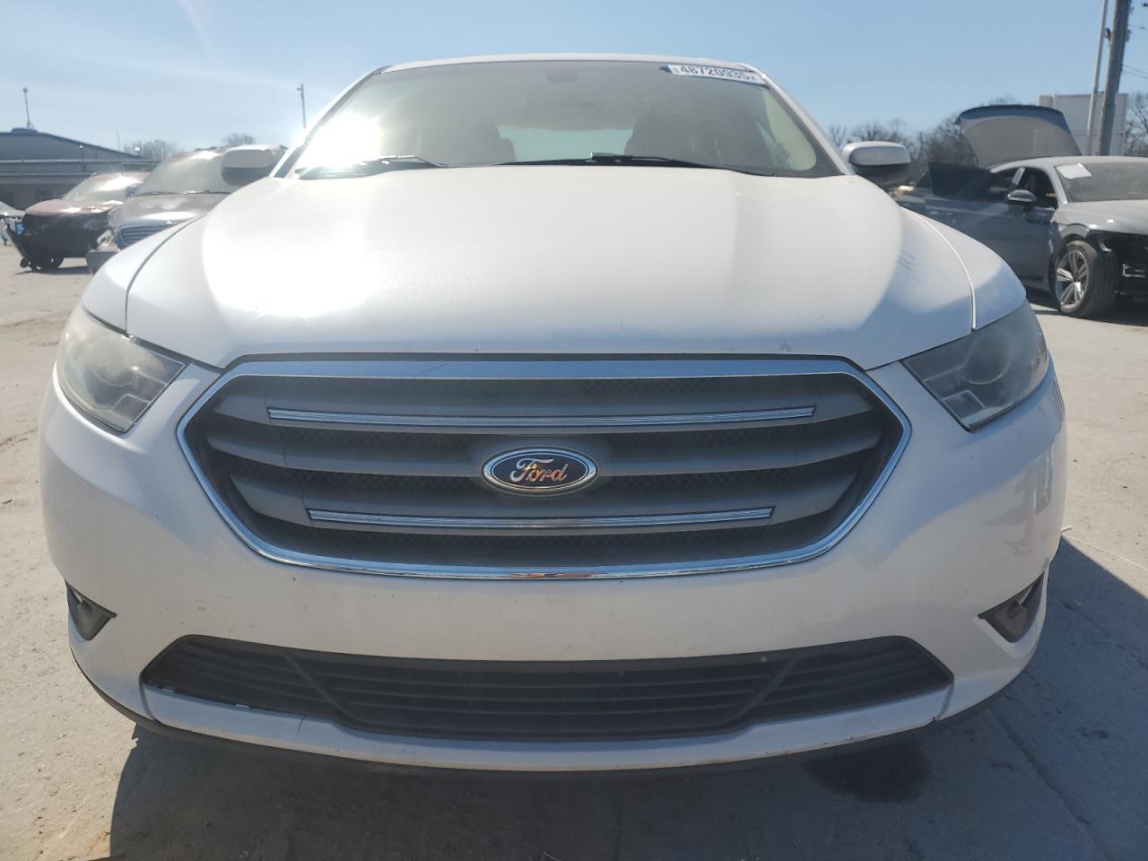 2014 Ford Taurus VIN 1FAHP2E87EG120908 Copart auction photo, minor dent/scratches damage thumbnail 5