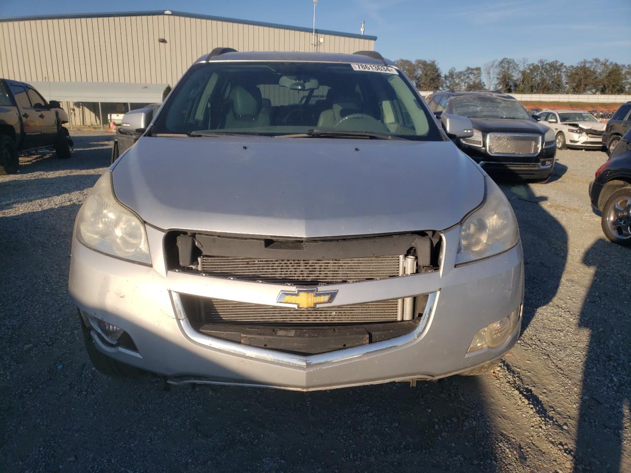 2011 Chevrolet Traverse VIN 1GNKRGED6BJ239351 Copart auction photo, front end / minor dent/scratches damage thumbnail 5