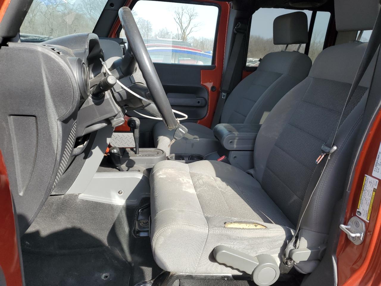 2009 Jeep Wrangler VIN 1J4GA69169L781784 Copart auction photo, side / front end damage thumbnail 7