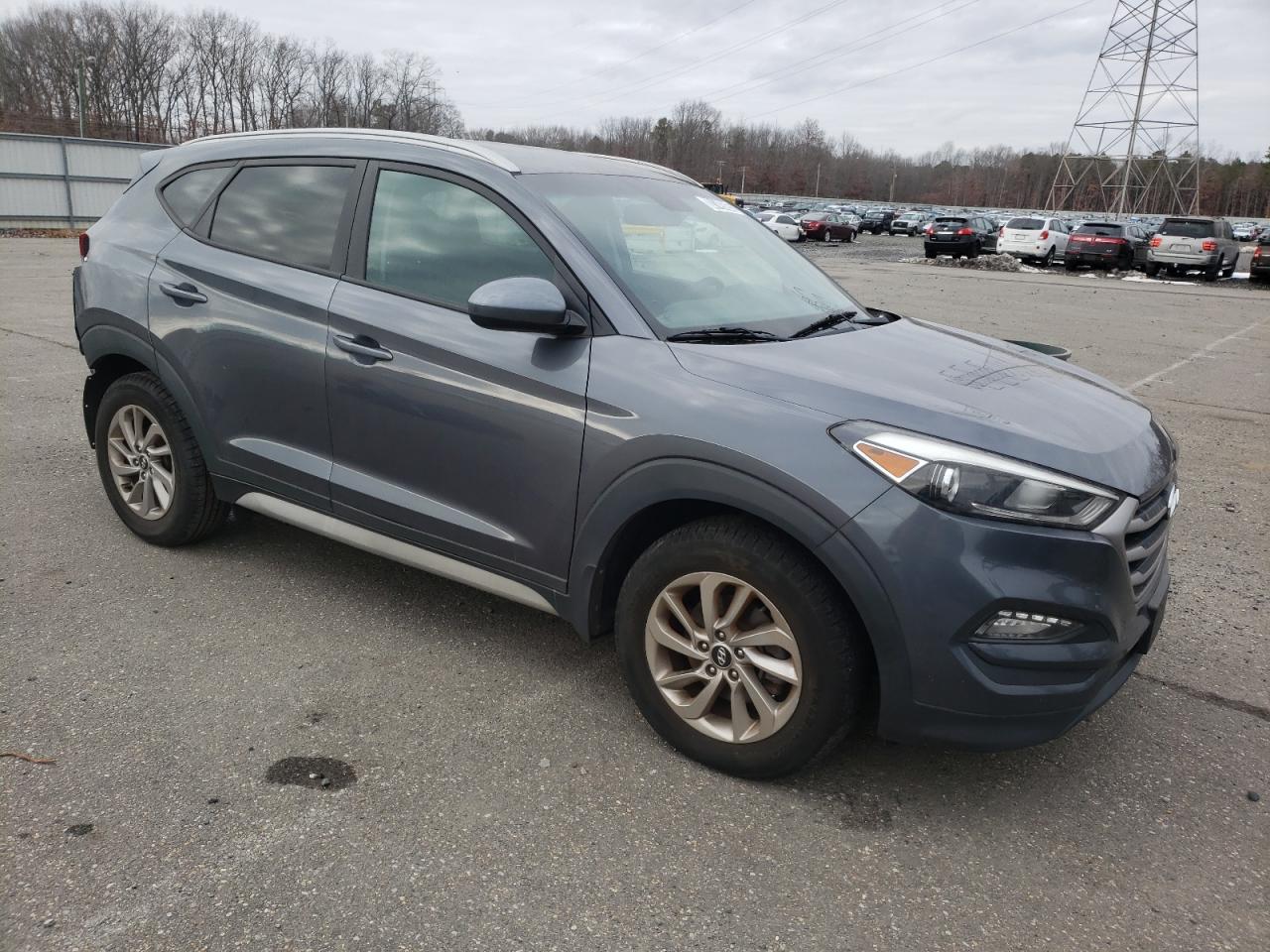 2018 Hyundai Tucson VIN KM8J3CA43JU755602 Copart auction photo, rear end / minor dent/scratches damage thumbnail 4