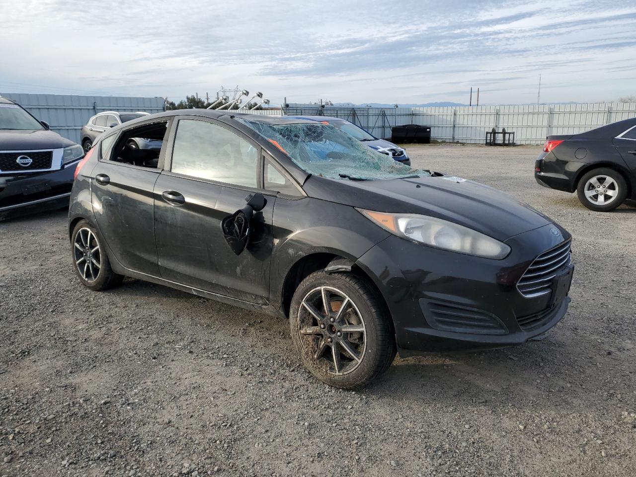 2015 Ford Fiesta VIN 3FADP4EJ8FM159169 Copart auction photo, rollover damage thumbnail 4