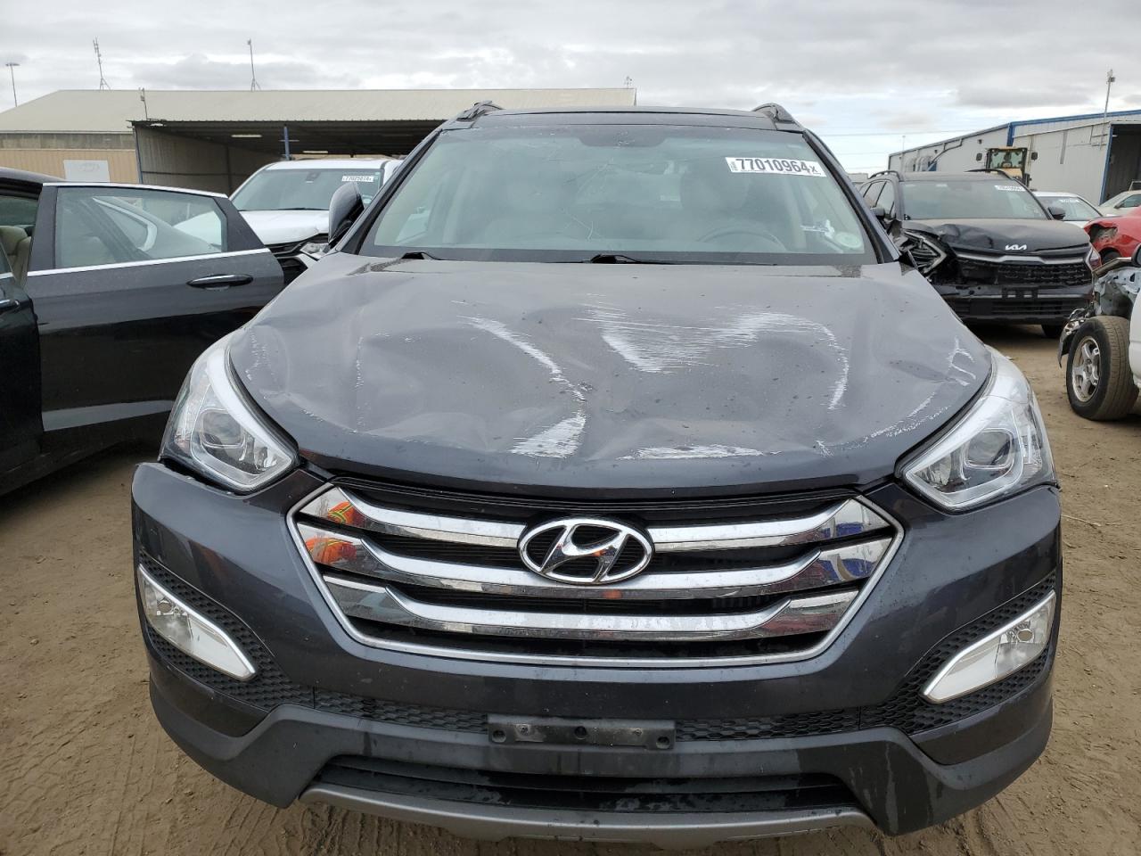 2016 Hyundai Santa Fe VIN 5XYZWDLA4GG317141 Copart auction photo, all over damage thumbnail 5