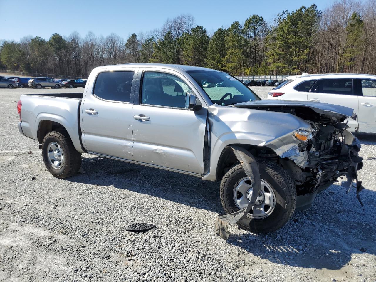 2021 Toyota Tacoma VIN 3TYCZ5AN6MT022568 Copart auction photo, all over damage thumbnail 4