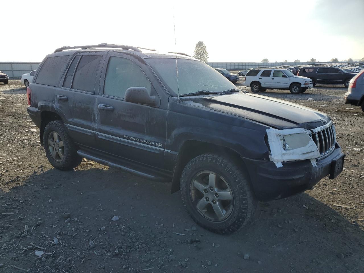 2004 Jeep Grand Cherokee VIN 1J8GW68J54C244589 Copart auction photo, front end damage thumbnail 4