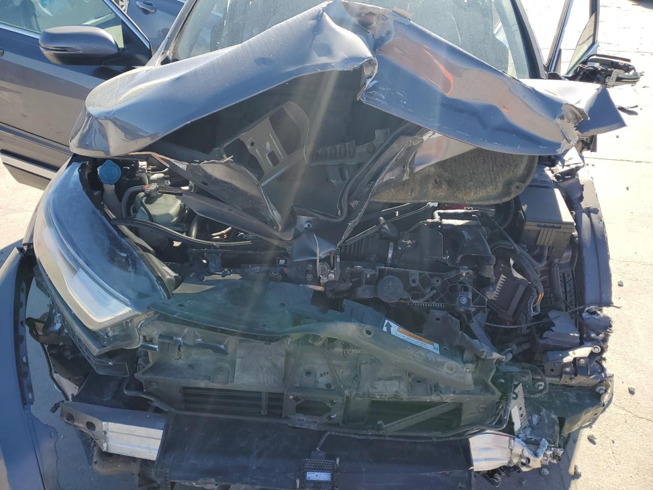 2020 Honda CR-V VIN 7FARW1H95LE002254 Copart auction photo, front end / hail damage thumbnail 12