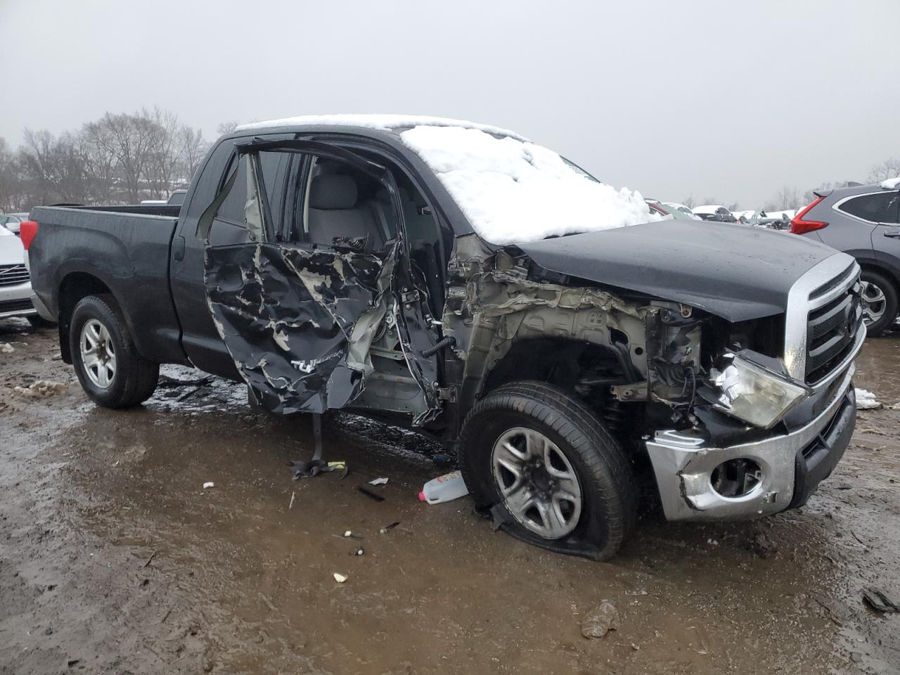 2011 Toyota Tundra VIN 5TFRM5F1XBX029914 Copart auction photo, front end / side damage thumbnail 4