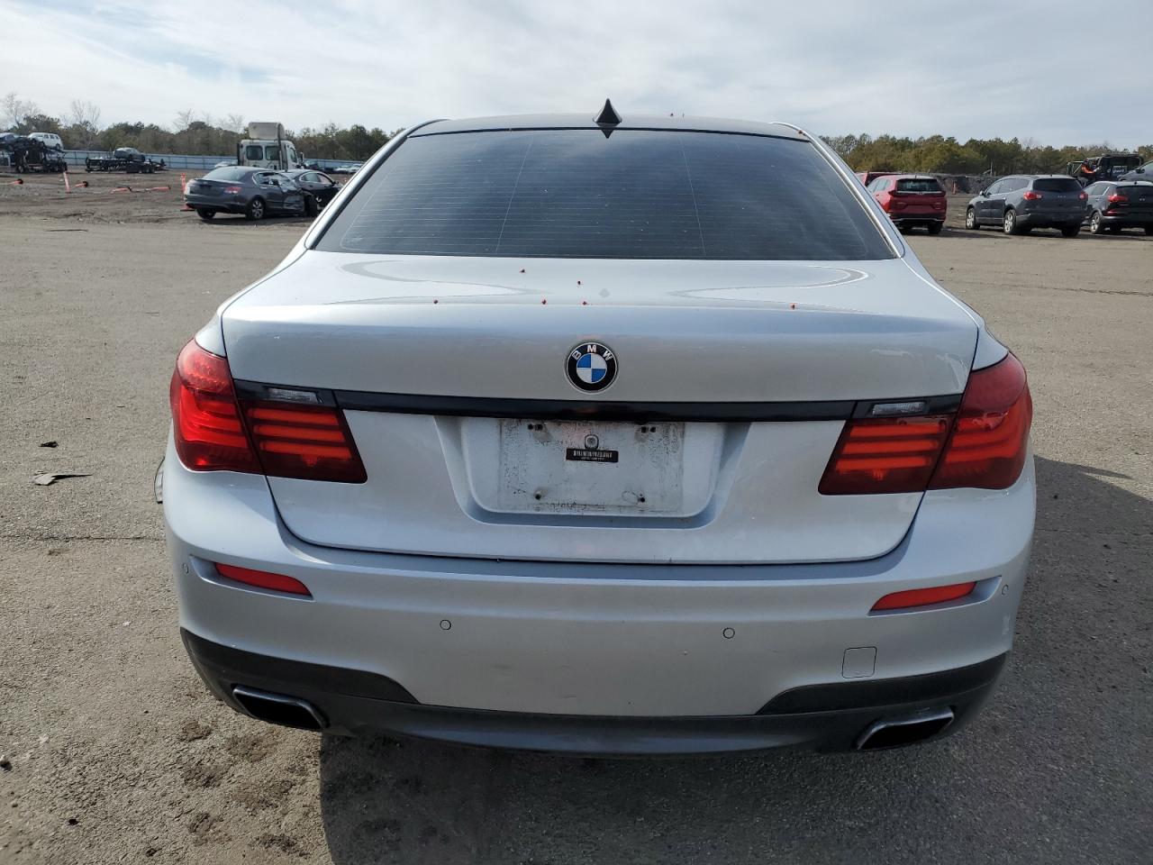 2013 BMW 7er VIN WBAYE4C55DD137207 Copart auction photo, front end / undercarriage damage thumbnail 6