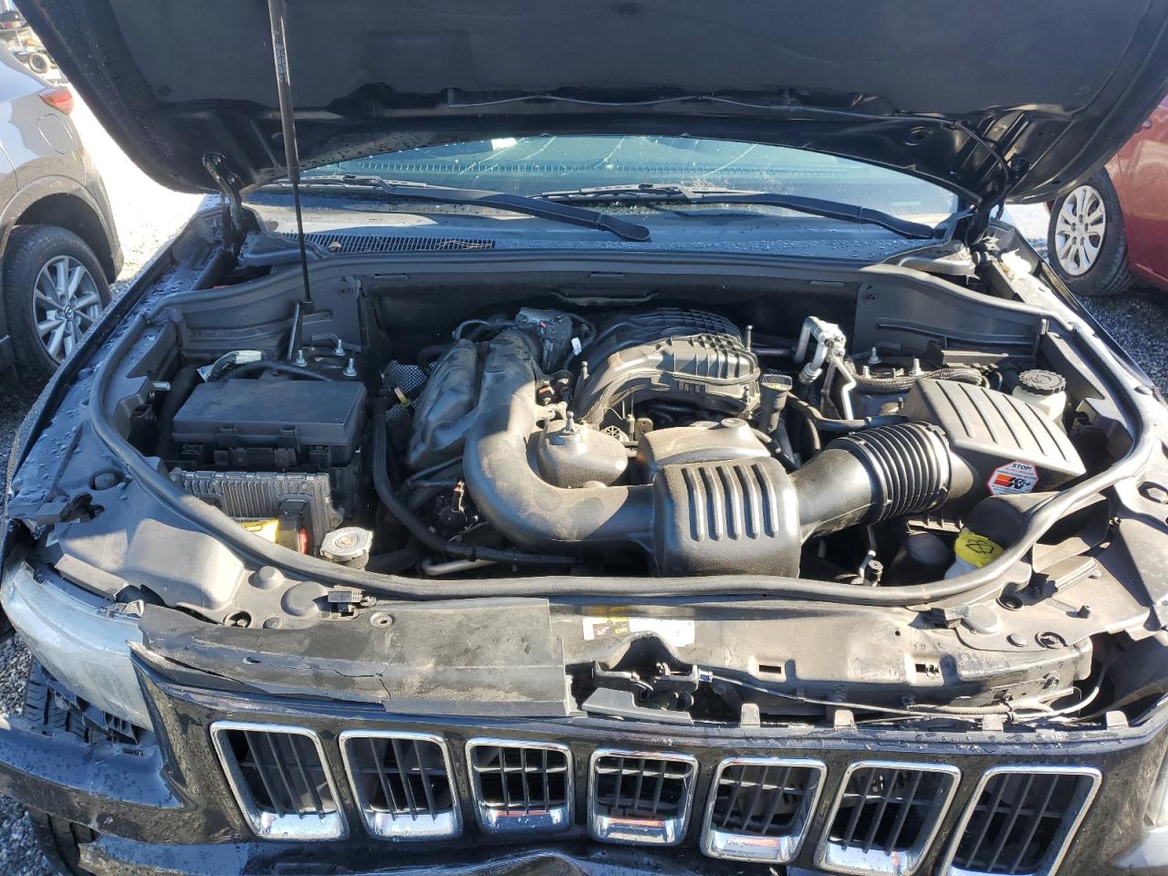 2014 Jeep Grand Cherokee VIN 1C4RJFAG3EC180664 Copart auction photo, front end / side damage thumbnail 12