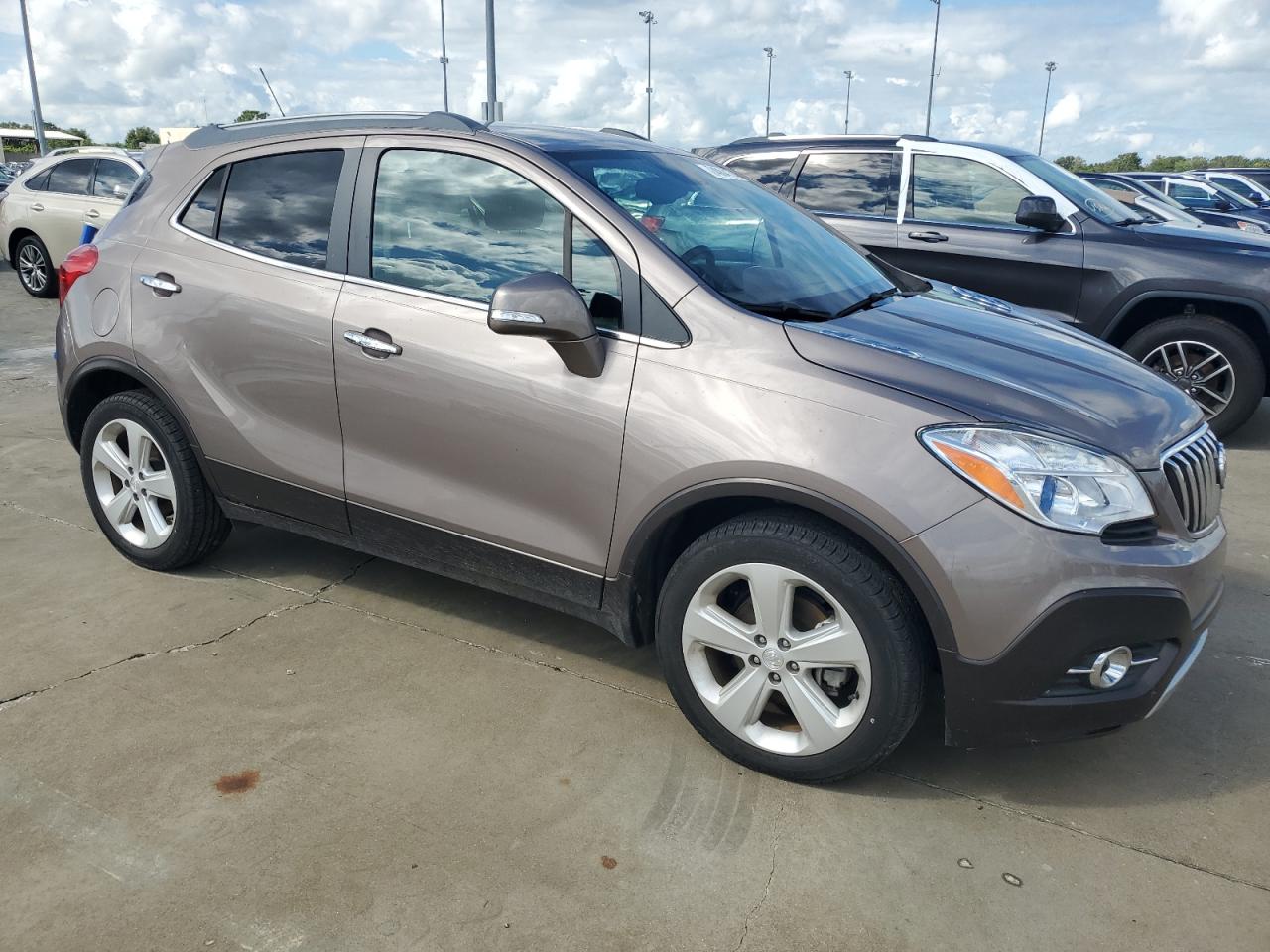 2015 Buick Encore VIN KL4CJCSB0FB189105 Copart auction photo, water/flood damage thumbnail 4