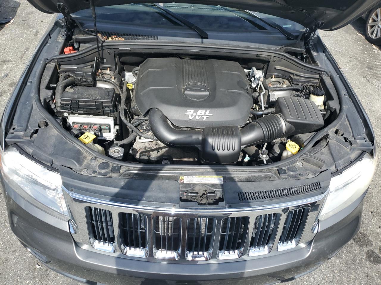 2012 Jeep Grand Cherokee VIN 1C4RJFAG2CC352048 Copart auction photo, side / front end damage thumbnail 12