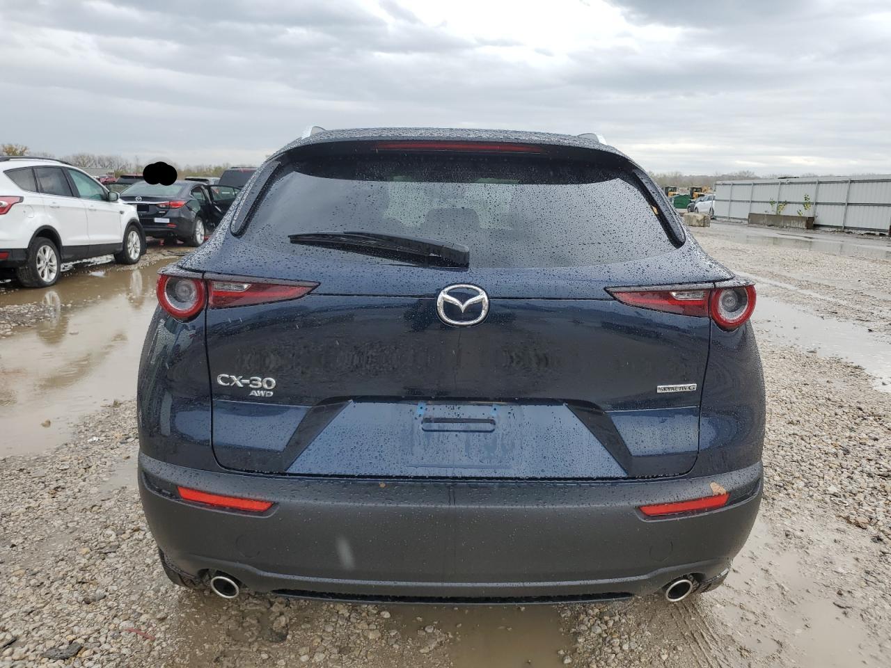 2023 Mazda CX-30 VIN 3MVDMBCM8PM571080 Copart auction photo, front end / side damage thumbnail 6