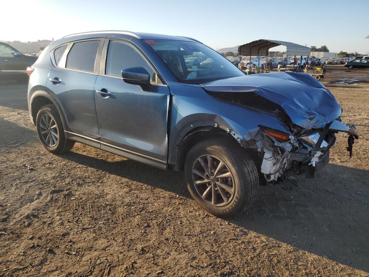 2023 Mazda CX-5 VIN JM3KFBBM3P0236369 Copart auction photo, front end damage thumbnail 4