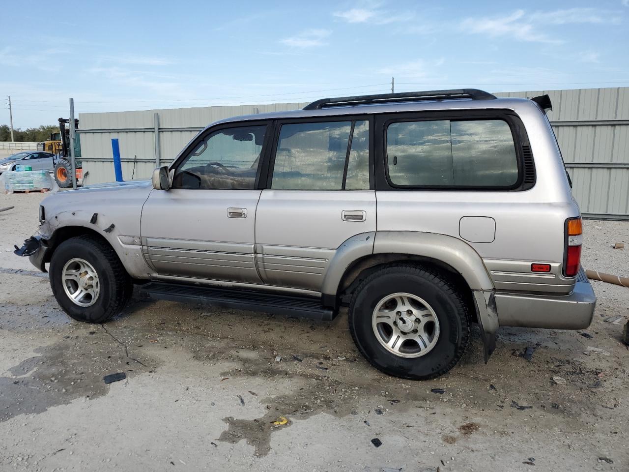 1997 Lexus LX VIN JT6HJ88J4V0172381 Copart auction photo, front end / minor dent/scratches damage thumbnail 2