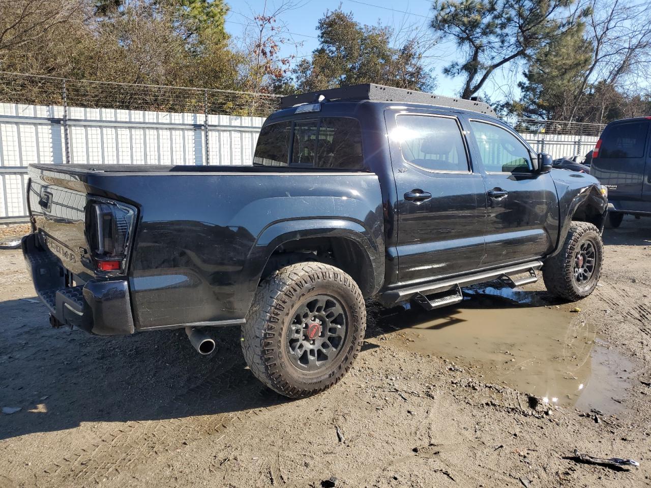 2023 Toyota Tacoma VIN 3TMCZ5AN0PM595594 Copart auction photo, front end / minor dent/scratches damage thumbnail 3