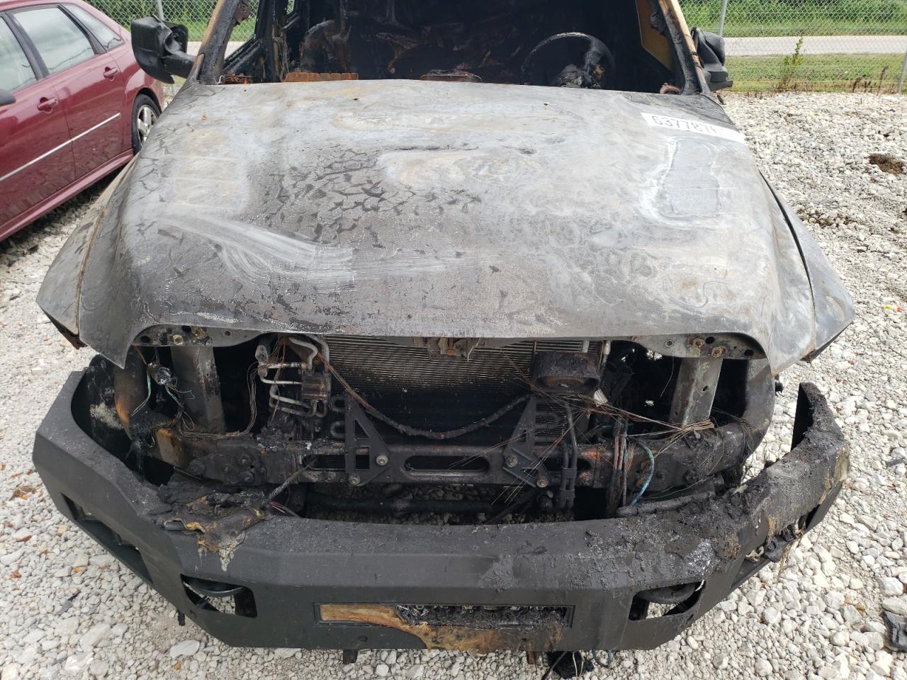 2013 RAM 2500 VIN 3C6TR5CT9DG568973 Copart auction photo, burn damage thumbnail 11