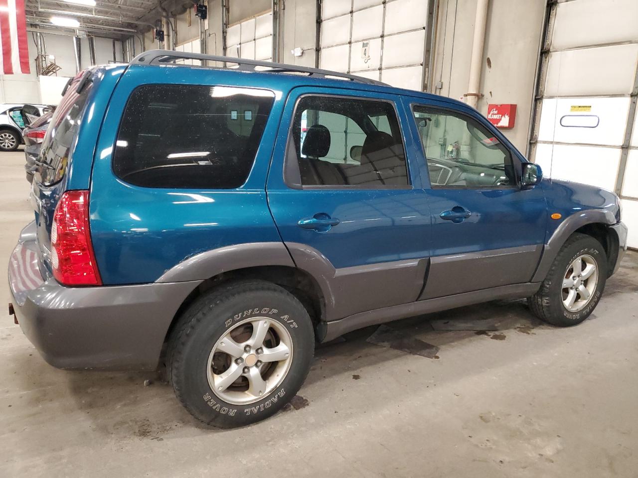 2005 Mazda Tribute VIN 4F2CZ94175KM05942 Copart auction photo, minor dent/scratches / undercarriage damage thumbnail 3