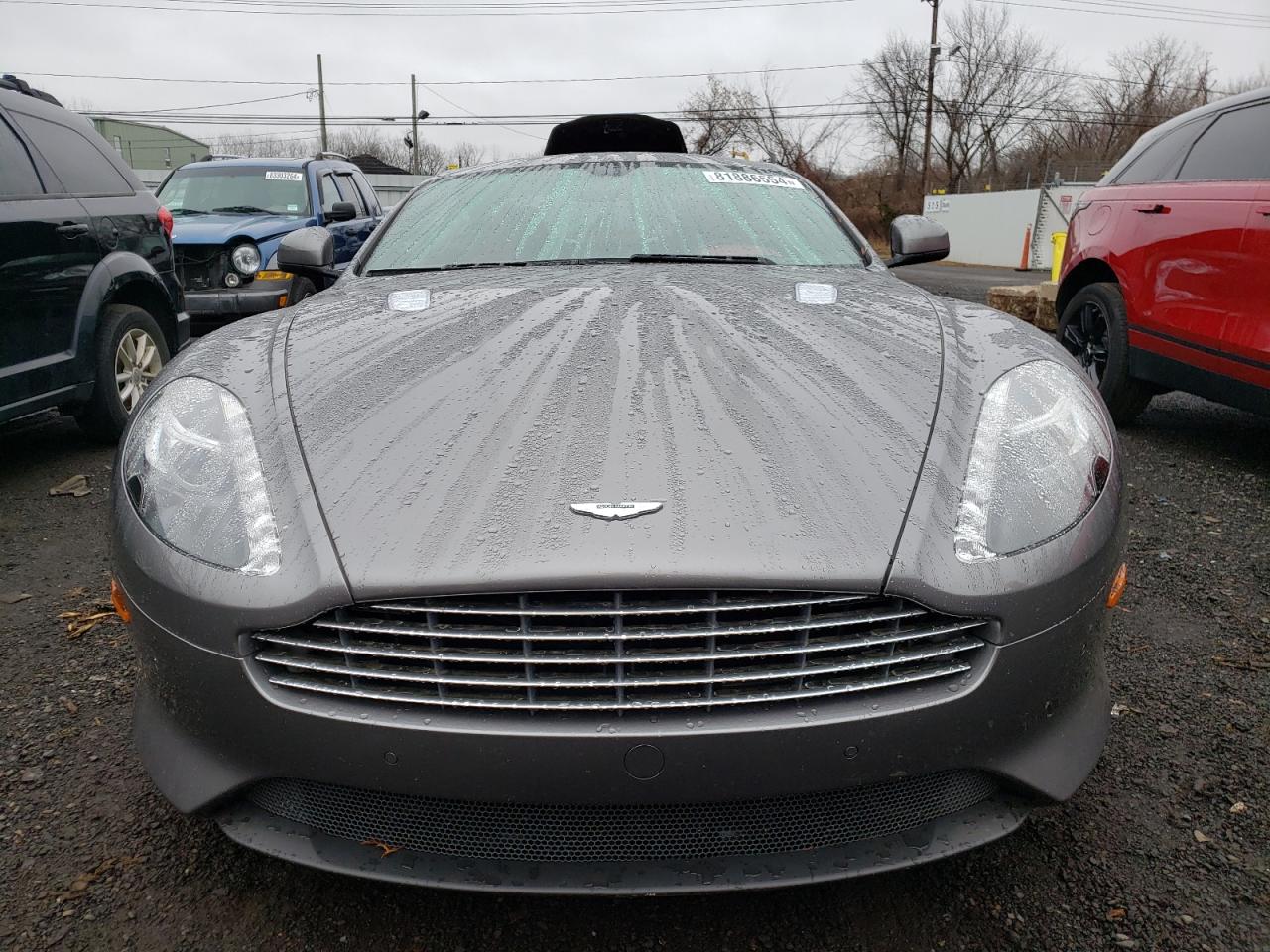 2015 Aston Martin DB9 VIN SCFFDAEM9FGA16279 Copart auction photo, rear end / minor dent/scratches damage thumbnail 5