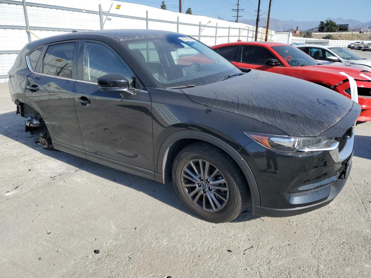 2021 Mazda CX-5 VIN JM3KFACM1M1306322 Copart auction photo, rear end / side damage thumbnail 4