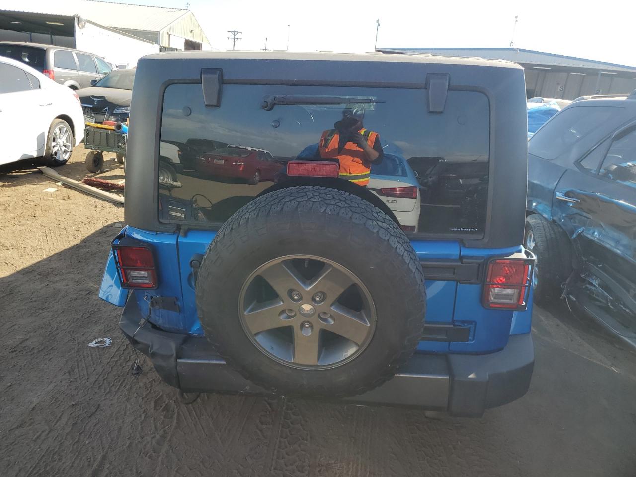 2015 Jeep Wrangler VIN 1C4BJWDG4FL573104 Copart auction photo, rear end damage thumbnail 6