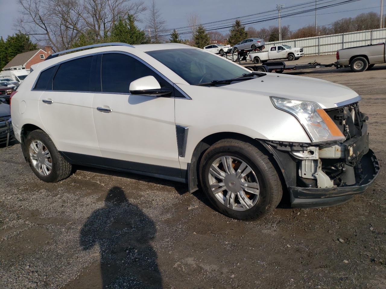 2016 Cadillac SRX VIN 3GYFNBE3XGS572877 Copart auction photo, front end / minor dent/scratches damage thumbnail 4