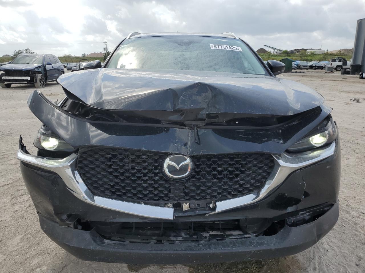 2023 Mazda CX-30 VIN 3MVDMBBM0PM523753 Copart auction photo, front end / minor dent/scratches damage thumbnail 5