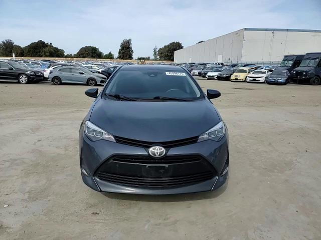 2017 Toyota Corolla VIN 5YFBURHE7HP710502 Copart auction photo, side / rear end damage thumbnail 11