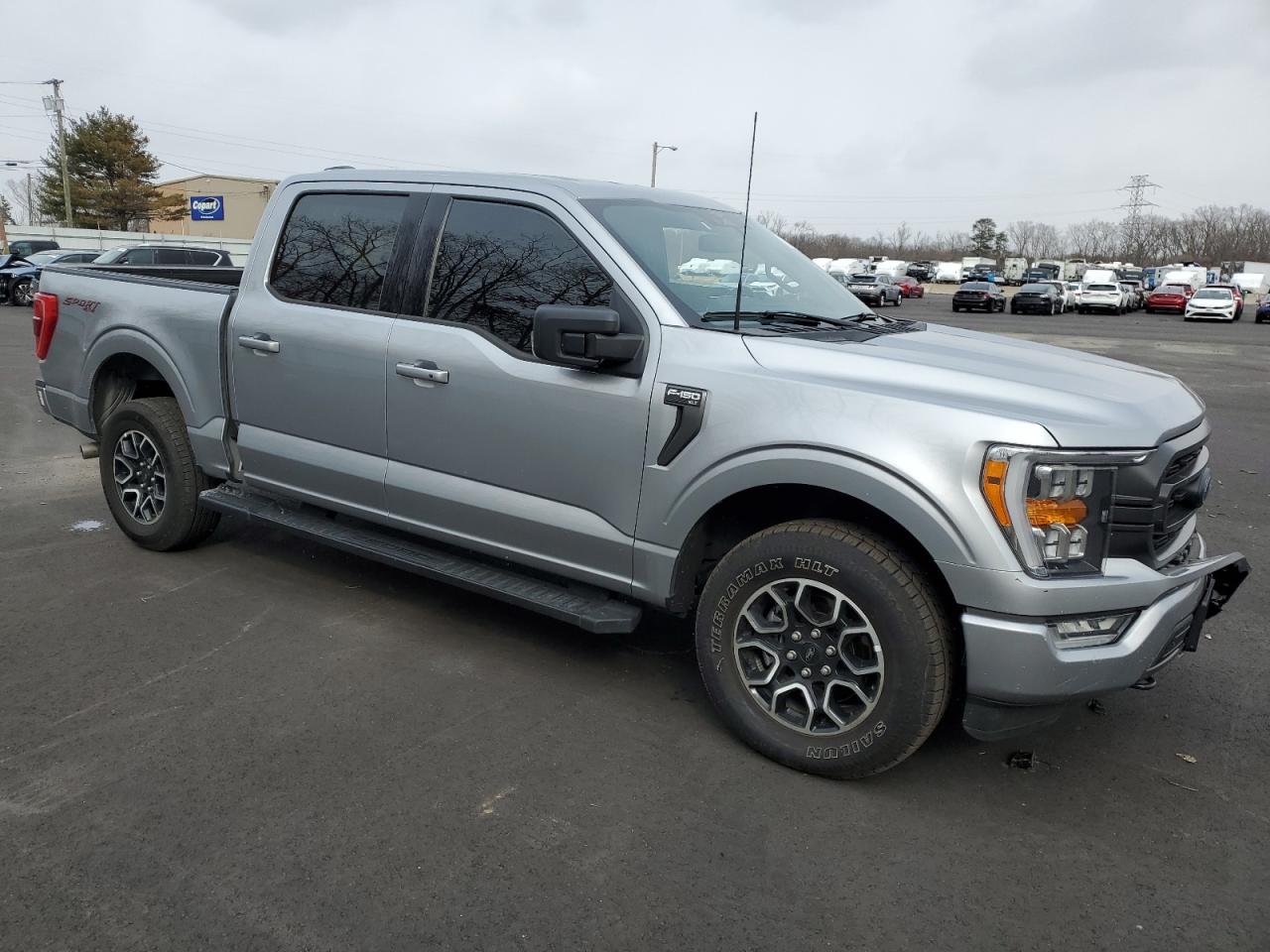 2023 Ford F-150 VIN 1FTFW1E59PFB57245 Copart auction photo, side / front end damage thumbnail 4