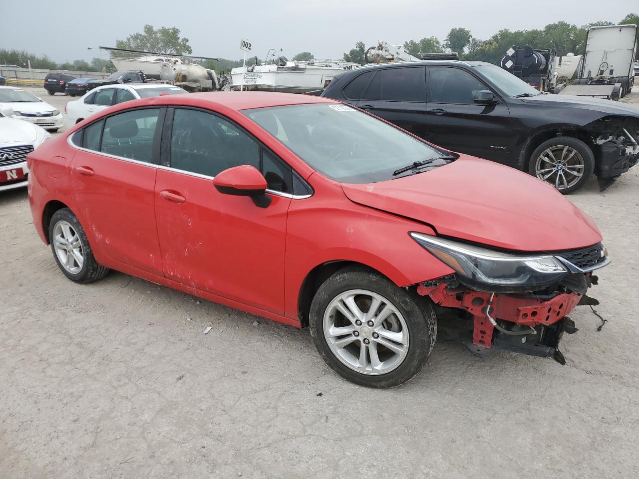 2018 Chevrolet Cruze VIN 1G1BE5SM2J7169705 Copart auction photo, front end / side damage thumbnail 4
