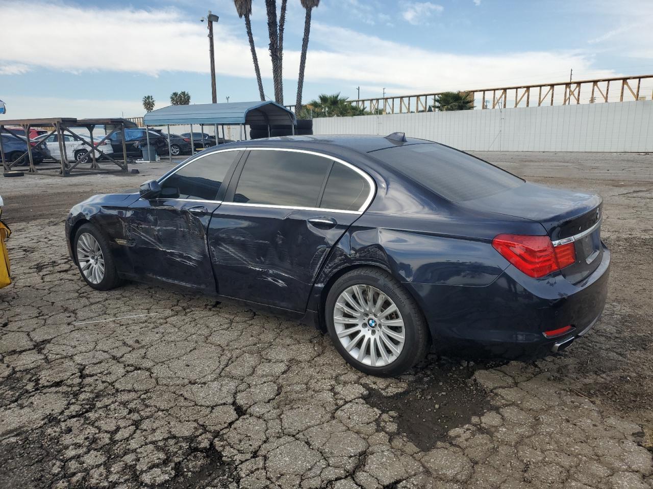 2012 BMW 7er VIN WBAKC8C5XCC436635 Copart auction photo, side damage thumbnail 2