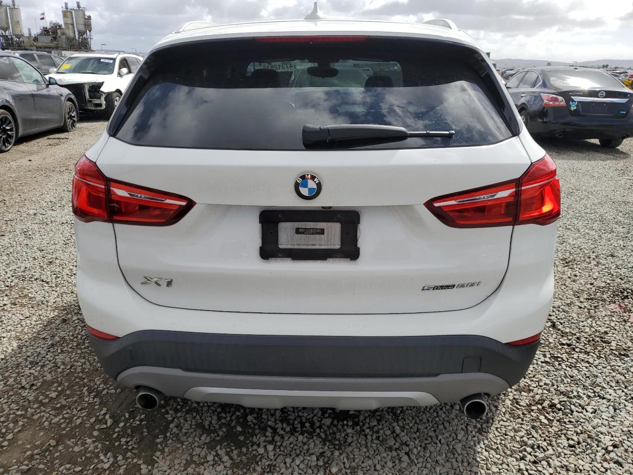 2018 BMW X1 VIN WBXHU7C3XJ5L06782 Copart auction photo, rear end damage thumbnail 6