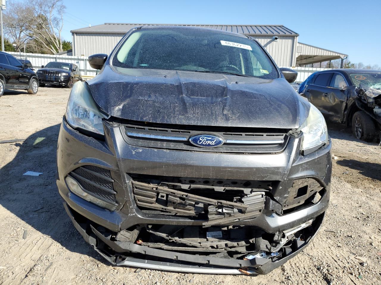 2015 Ford Escape VIN 1FMCU0G7XFUC32896 Copart auction photo, front end / side damage thumbnail 5