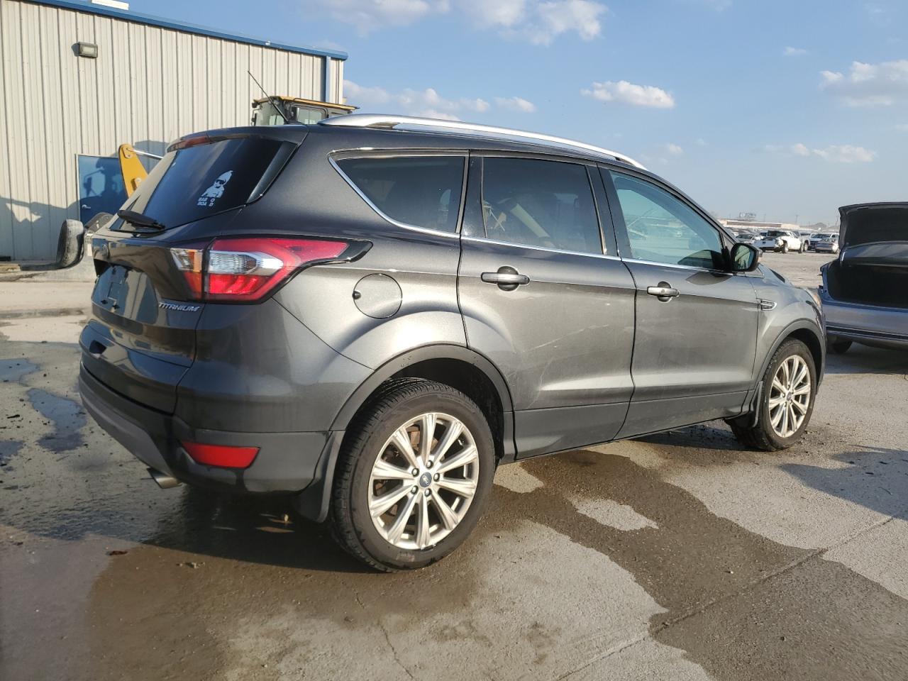 2017 Ford Escape VIN 1FMCU0J99HUF05792 Copart auction photo, front end / minor dent/scratches damage thumbnail 3