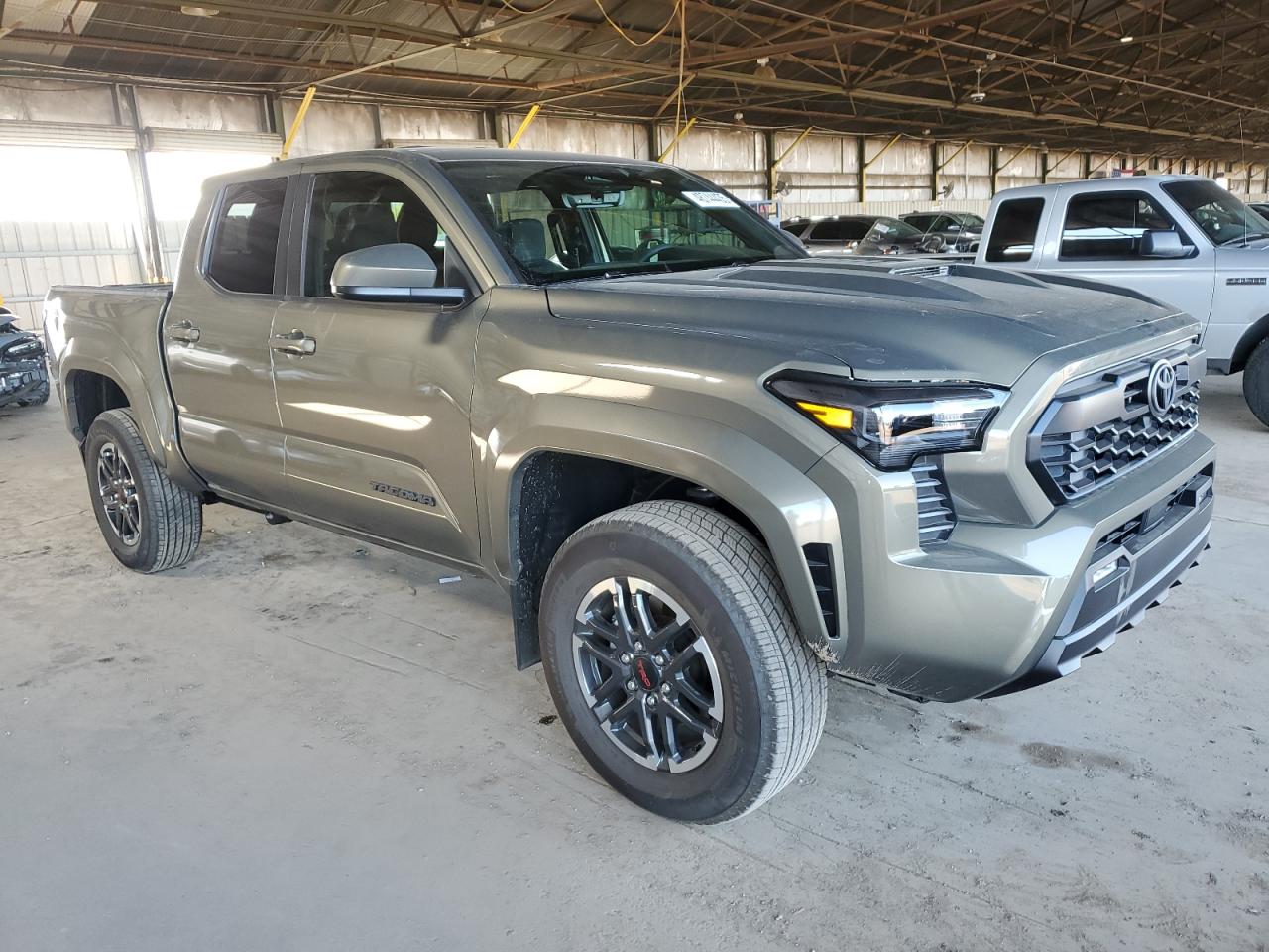 2024 Toyota Tacoma VIN 3TMKB5FN3RM017663 Copart auction photo, rear end / minor dent/scratches damage thumbnail 4