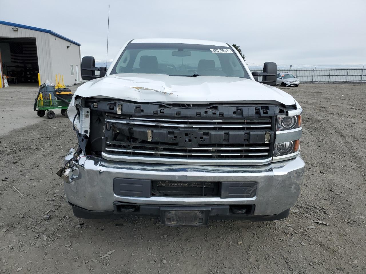 2015 Chevrolet Silverado VIN 1GC0KUEG1FZ108011 Copart auction photo, front end / side damage thumbnail 5