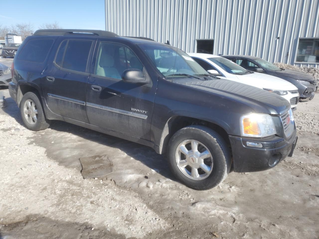 2006 GMC Envoy VIN 1GKET16S466125461 Copart auction photo, rear end damage thumbnail 4
