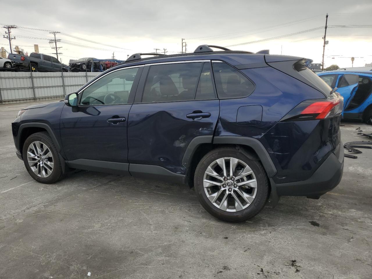 2023 Toyota RAV 4 VIN 2T3C1RFV7PW249466 Copart auction photo, side / rear end damage thumbnail 2