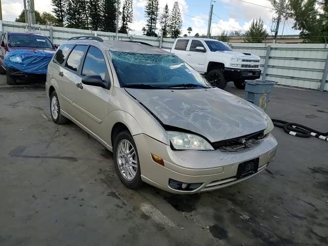 2007 Ford Focus VIN 1FAHP36N27W205545 Copart auction photo, all over / top/roof damage thumbnail 11