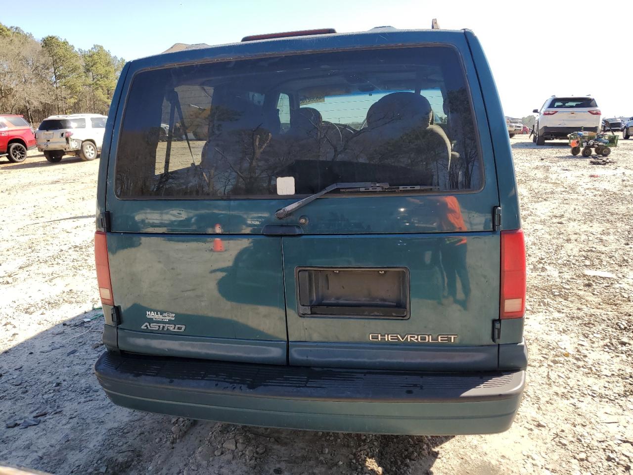 1999 Chevrolet Astro VIN 1GNDM19W2XB128376 Copart auction photo, side / front end damage thumbnail 6