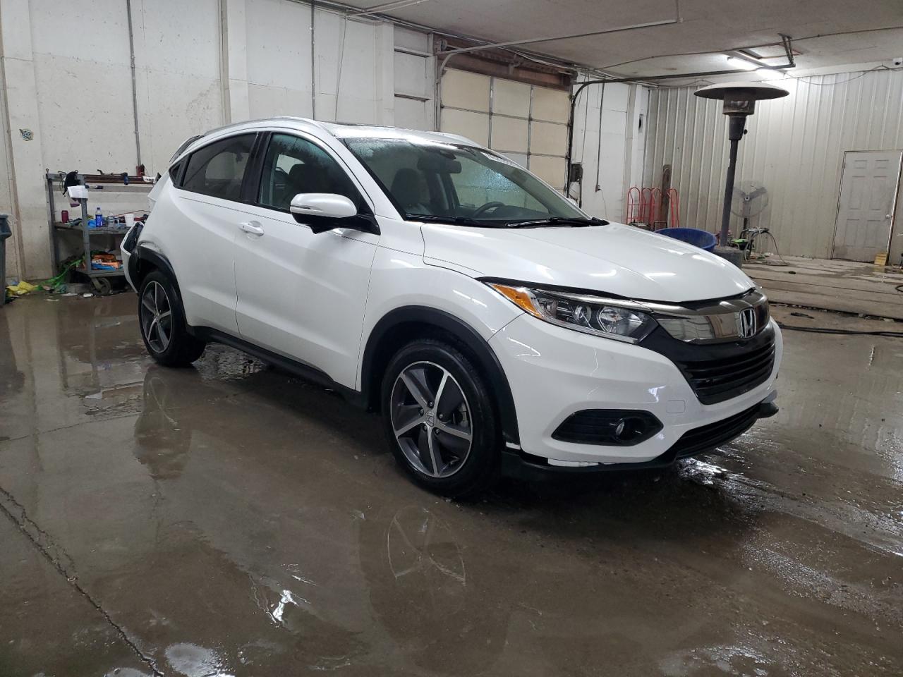 2022 Honda HR-V VIN 3CZRU5H78NM710904 Copart auction photo, rear end / minor dent/scratches damage thumbnail 4