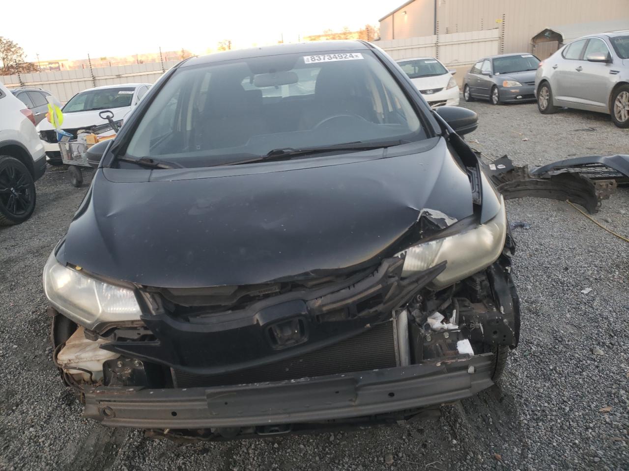 2016 Honda Fit VIN JHMGK5H52GX014634 Copart auction photo, all over damage thumbnail 5