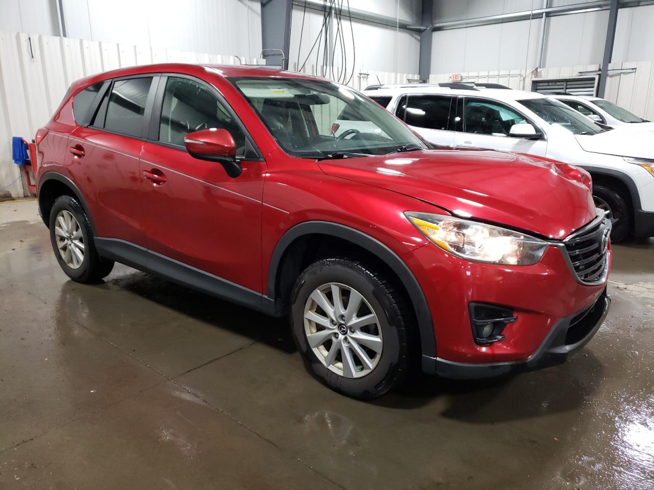 2016 Mazda CX-5 VIN JM3KE4CY3G0691562 Copart auction photo, front end / side damage thumbnail 4