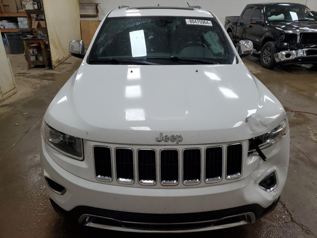 2016 Jeep Grand Cherokee VIN 1C4RJFBG3GC402427 Copart auction photo, side / front end damage thumbnail 5