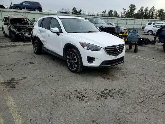 2016 Mazda CX-5 VIN JM3KE4DY0G0786207 Copart auction photo, side / undercarriage damage thumbnail 12