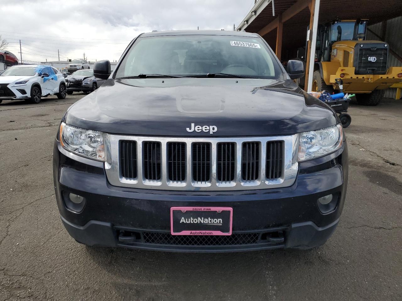 2011 Jeep Grand Cherokee VIN 1J4RR4GG8BC660743 Copart auction photo, side damage thumbnail 5