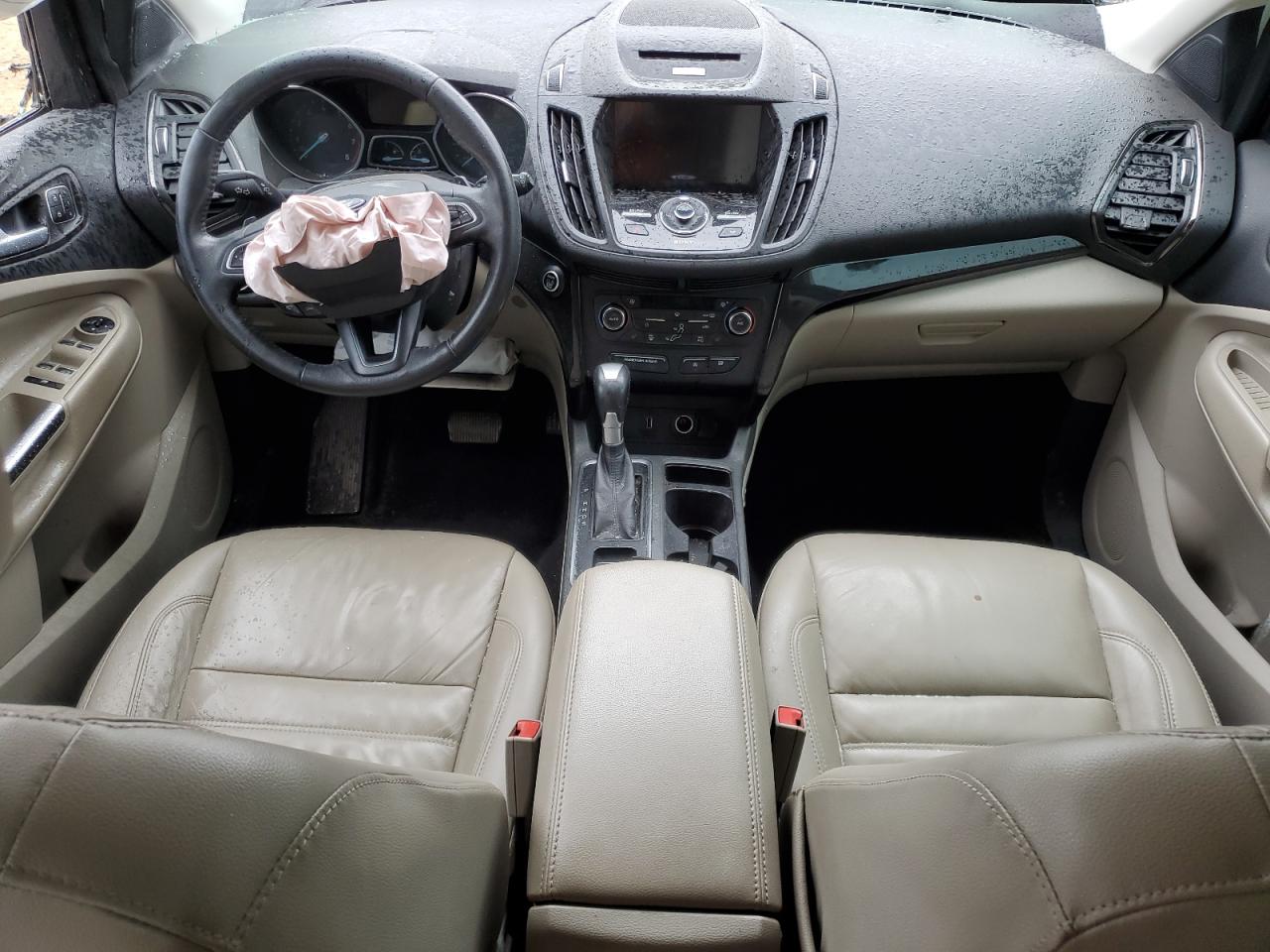 2017 Ford Escape VIN 1FMCU0J9XHUF01623 Copart auction photo, rollover damage thumbnail 8