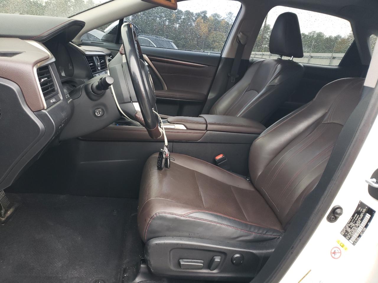 2016 Lexus RX VIN JTJBZMCA0G2009853 Copart auction photo, rear end / minor dent/scratches damage thumbnail 7