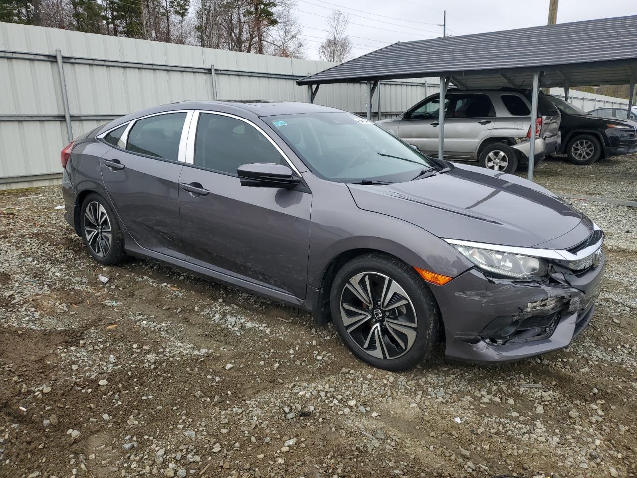 2017 Honda Civic VIN 2HGFC1F85HH646034 Copart auction photo, all over damage thumbnail 4