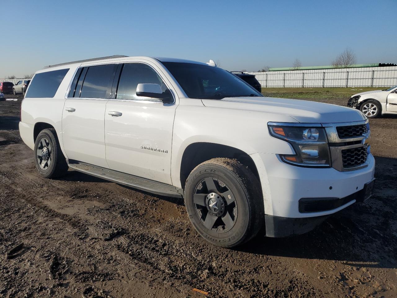 2018 Chevrolet Suburban VIN 1GNSCGKC0JR272245 Copart auction photo, side / undercarriage damage thumbnail 4